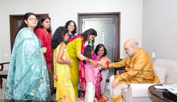 Amit Shah celebrates auspicious festival of Raksha Bandhan in Ahmedabad with girls from his parliamentary constituency who are suffering from Type-1 diabetes